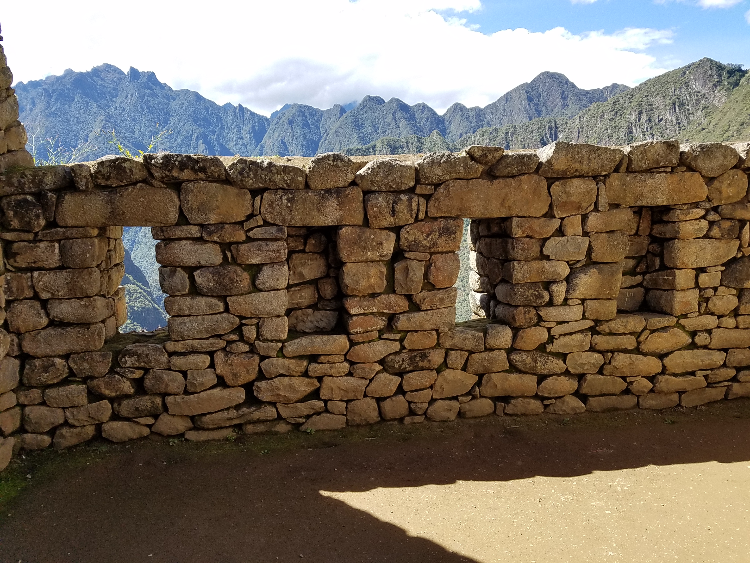 Wall with trapezoidal windows in Machu Picchu.