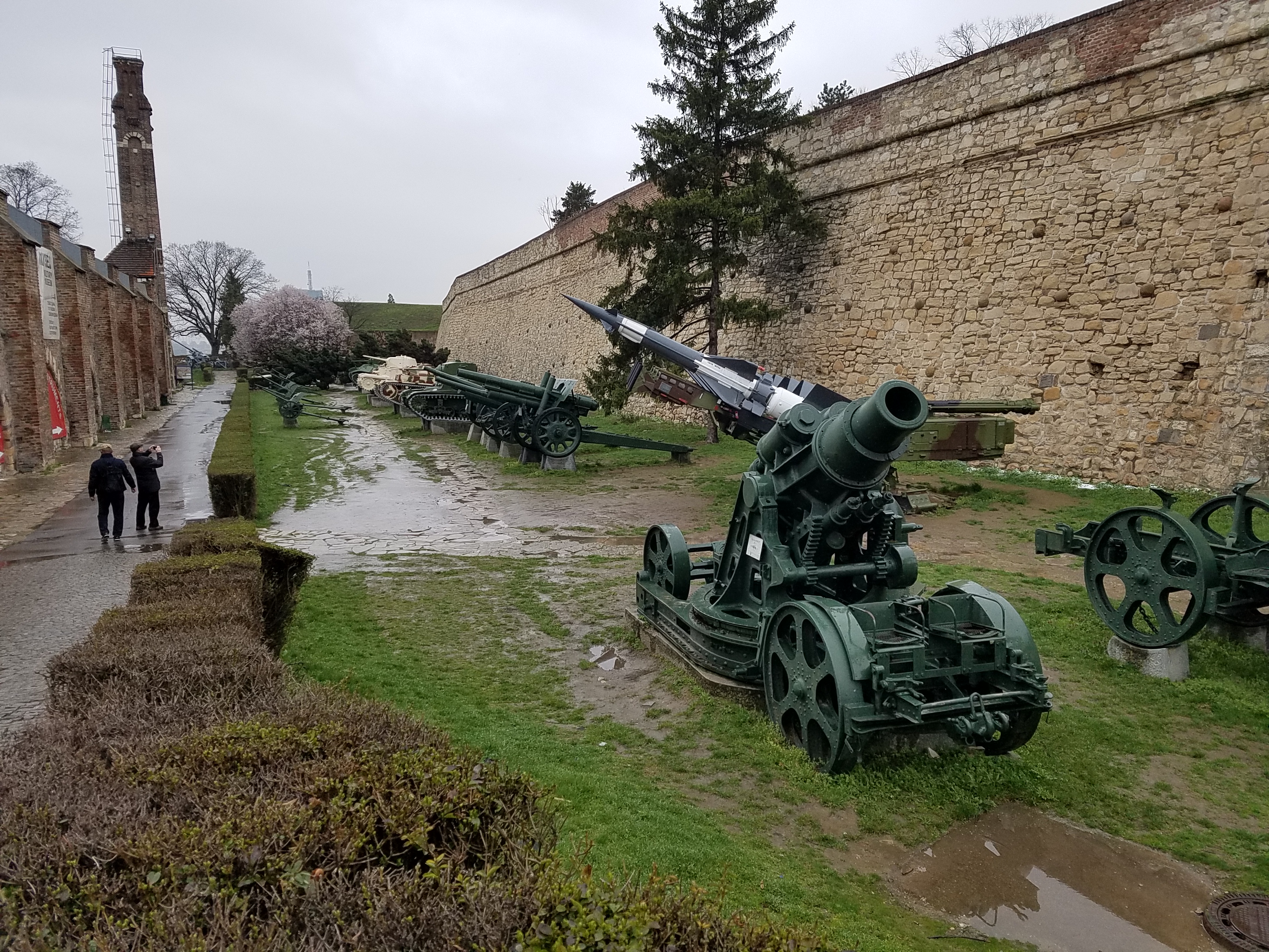 Along the walls of the Kalemegdan Fortress in Belgrade with a display of historic artillery.