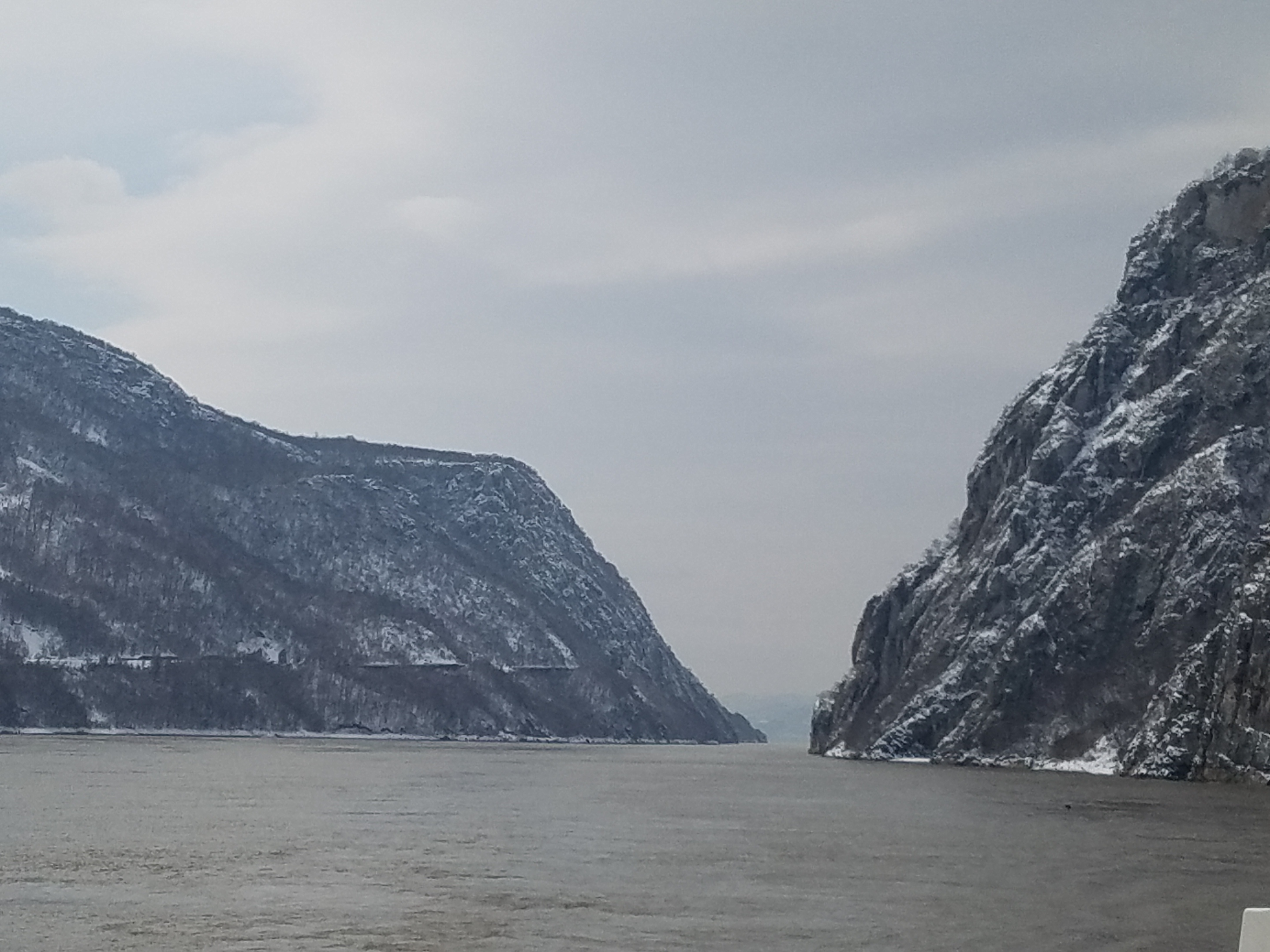 The Iron Gates is a gorge on the Danube River; it forms part of the boundary between Serbia and Romania. In the broad sense, it encompasses a route of 134 km (83 mi); in the narrow sense, it only includes the last barriers on this route - two hydroelectric dams and two power stations just beyond the city of Orsova. 