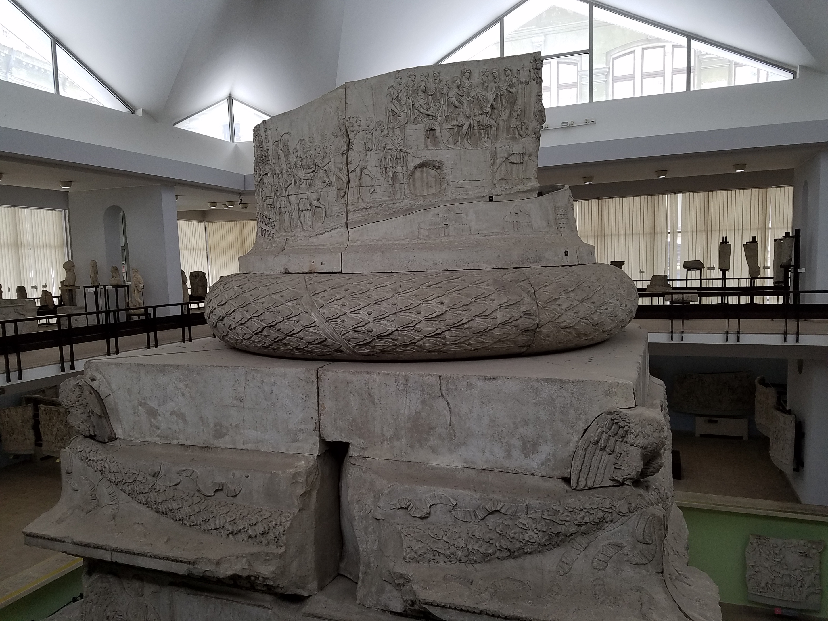 Cast of part of the base of Trajan's Column (the original stands in Rome) at the National Museum of Romanian History in Bucharest. The bas reliefs on Trajan's Column - which is about 30 m (98 ft) in height, 35 m (115 ft) including its large pedestal - depict the  second century A.D. Roman conquest of Dacia, the area that today is Romania and Moldova.