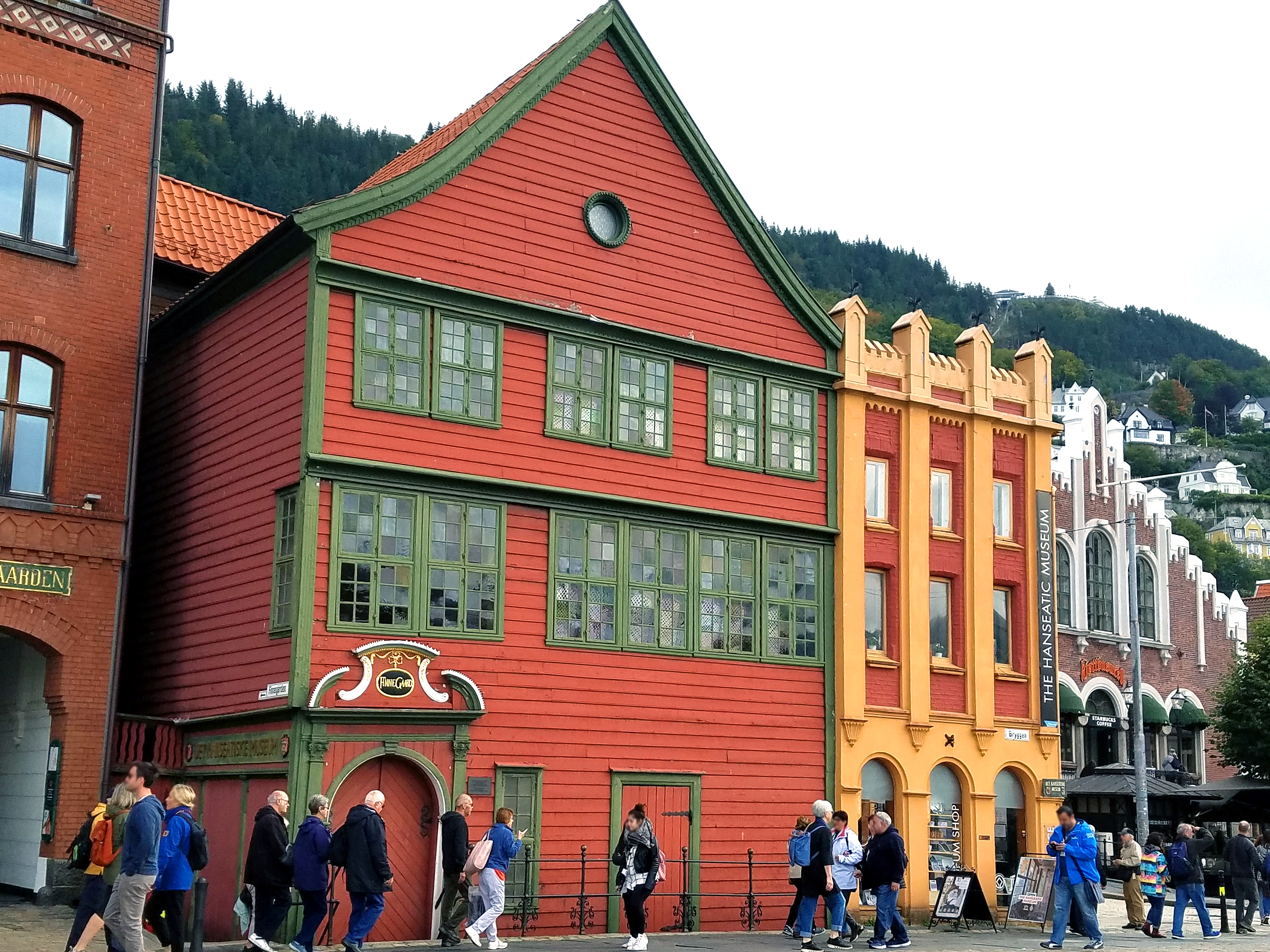 Brightly painted warehouses along the Hanseatic Wharf in Bryggen, the dock area of historic Bergen. Bryggen has been a UNESCO World Cultural Heritage site since 1979. 