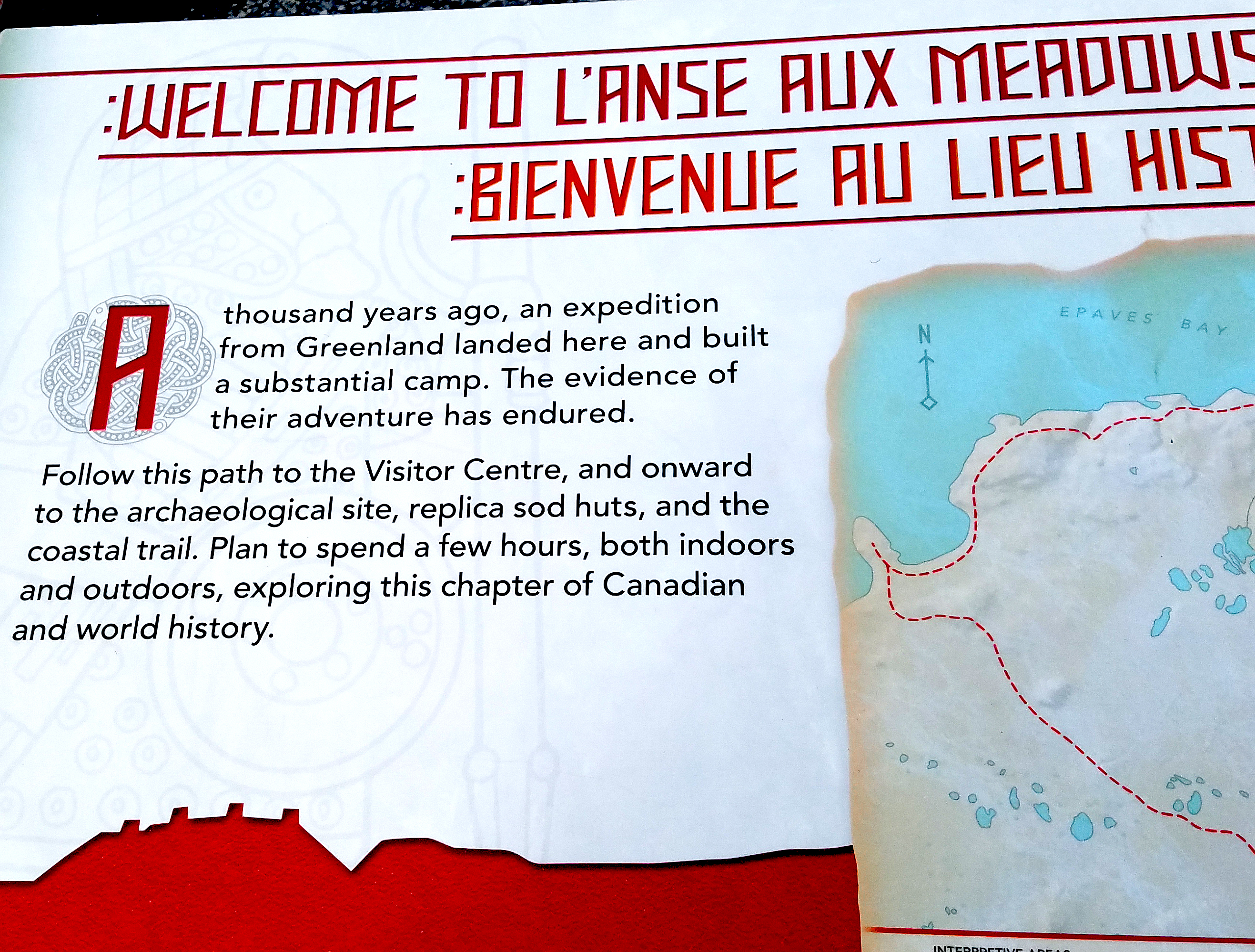 Welcoming sign at L’Anse Aux Meadows in Newfoundland.  The archeological site dates from about 1000 A.D.  It is thought to be the first Norse holding in North America - predating Columbus' arrival by five centuries.  The site probably was ship repair station, serving Norse ships from Greenland, rather than a settlement.  At the time, it was closer to the water and surrounded by trees. The site may only have been in use for about a century before being abandoned.