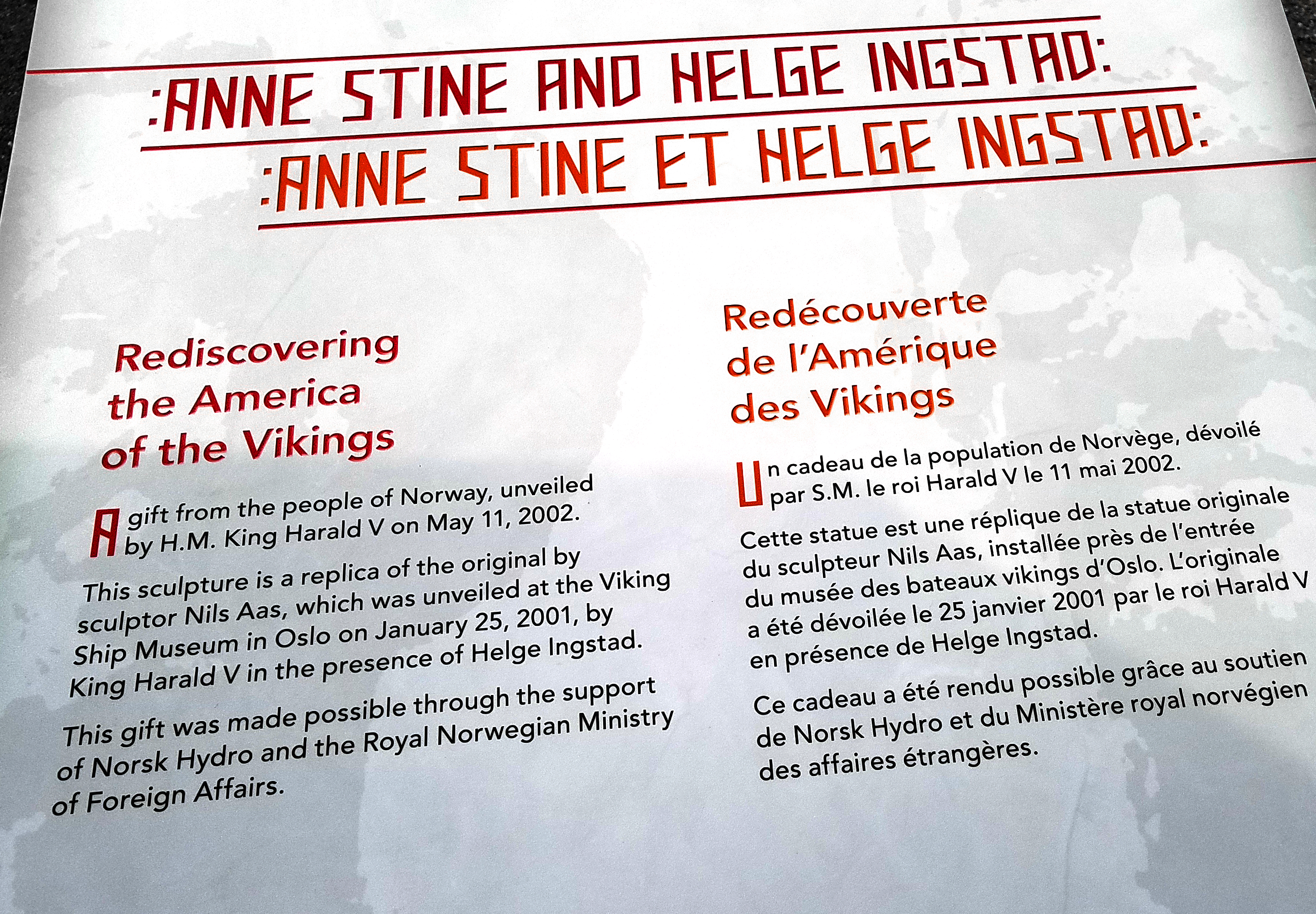Sign describing the statue of Anne Stine and Helge Ingstad, the co-discoverers of L’Anse Aux Meadows archeological site.