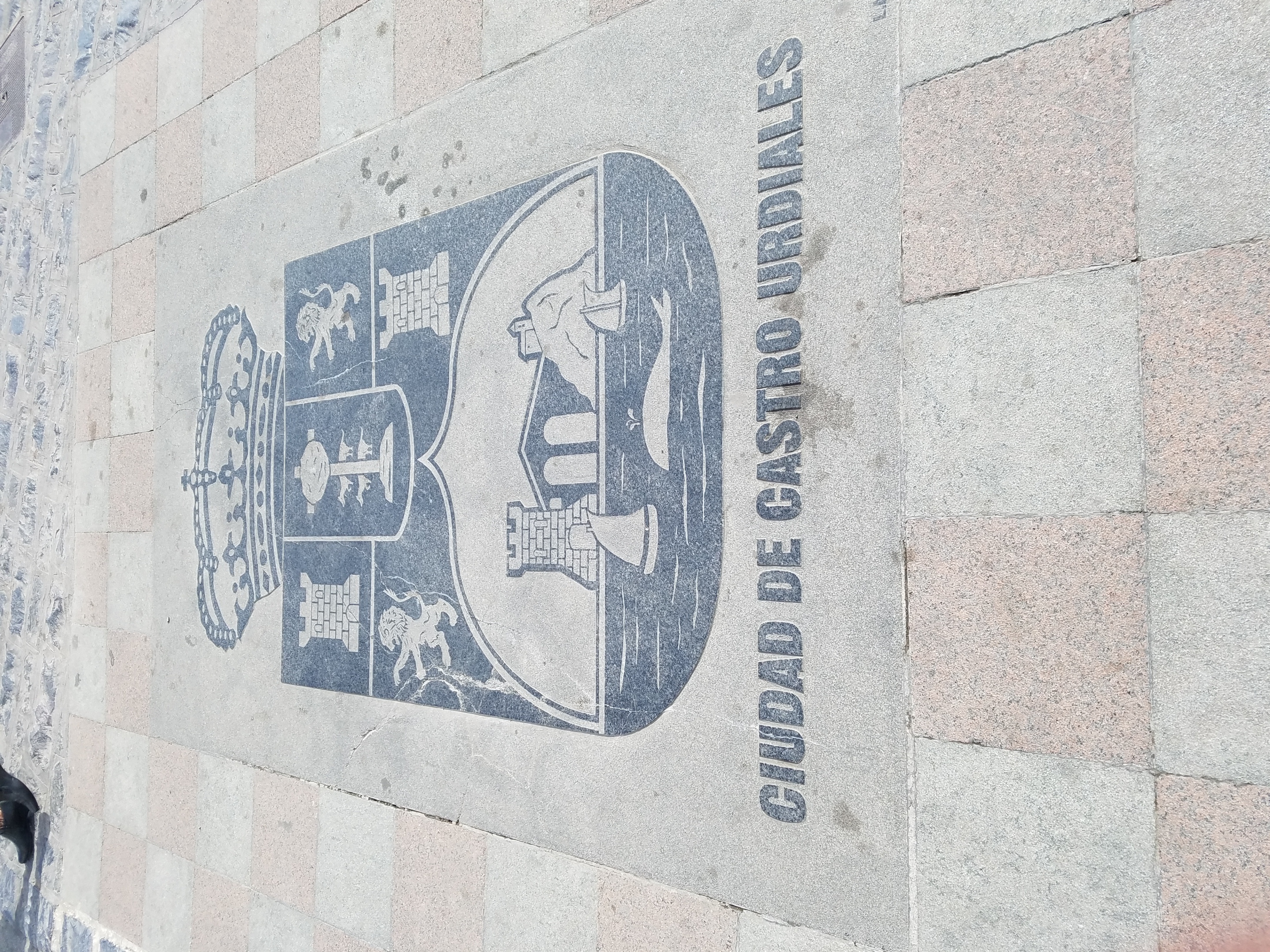 The town seal of Castro Urdiales in street tiles.