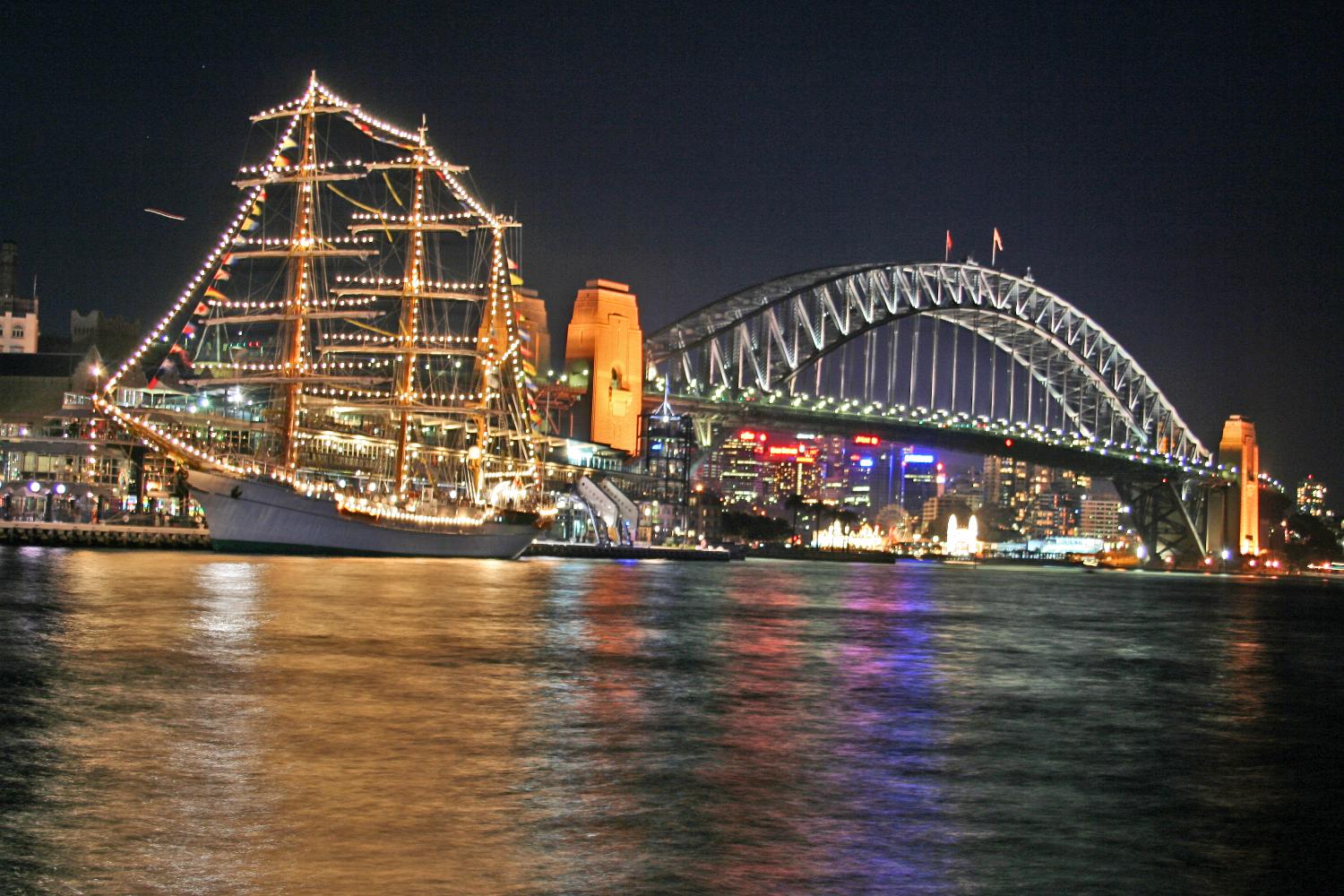 Sydney Harbour Bridge at night. The bridge was opened in 1932; it is the world's widest long-span bridge and tallest steel arch bridge.