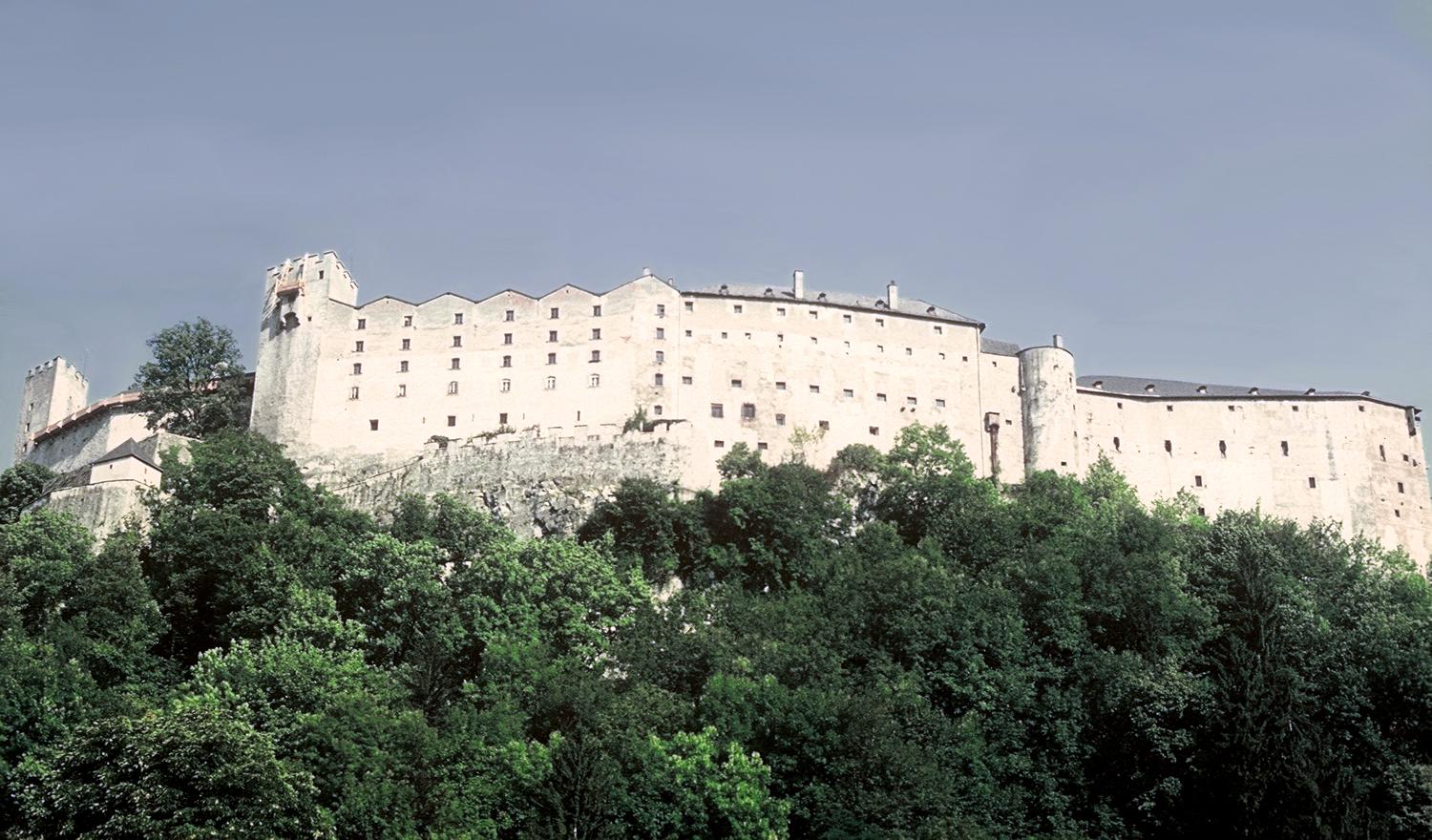 Hohensalzburg Castle overlooks the city of Salzburg. Roughly 250 m long and 150 m wide, it is one of the largest - and best preserved - medieval castles in Europe. Originally built as a wooden fortress in 1077, it was rebuilt and expanded many times in subsequent centuries. 