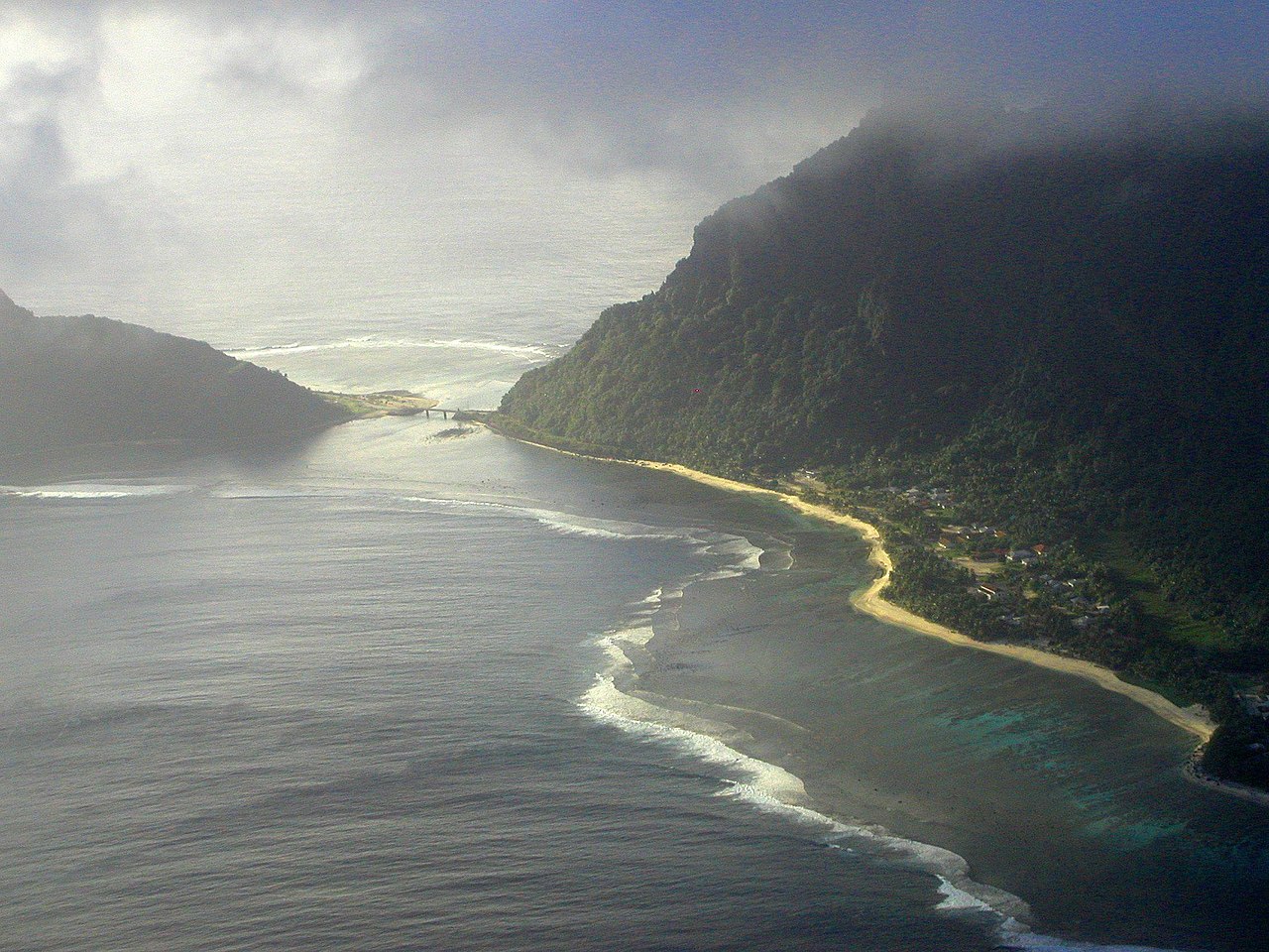 Aerial view of Ofu and Olosega islands. Olosega with Olosega Village is on the right, Ofu on the left. Both islands are connected via a single-lane bridge, crossing the narrow Asaga Srait. Photo courtesy of the US National Park Service/ Peter Craig.