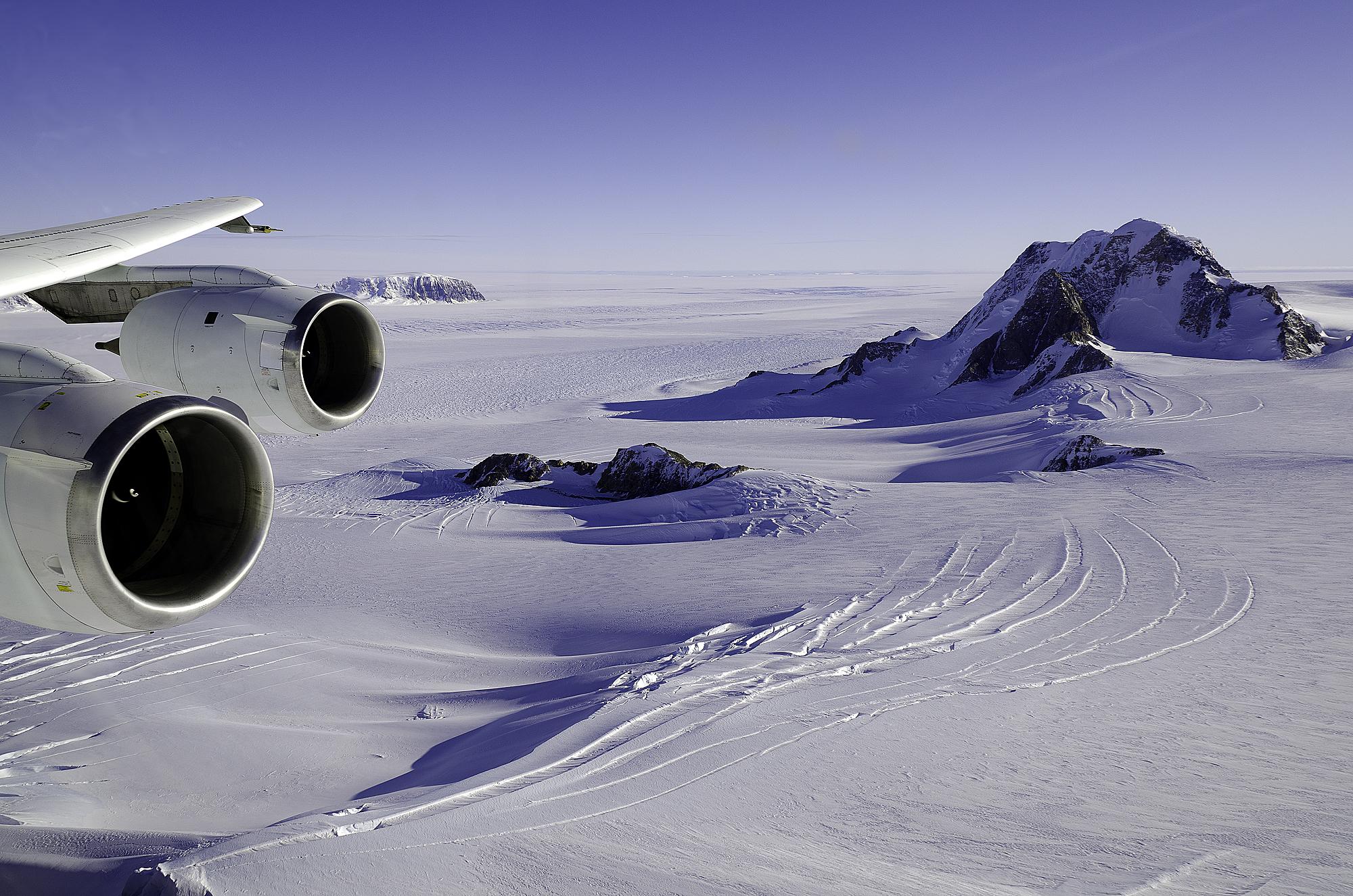 Glaciers and rock outcrops in Marie Byrd Land, West Antarctica during an Operation IceBridge flight - to monitor changes in Earth's polar ice caps - with a NASA DC-8 aircraft. Image courtesy of NASA/Michael Studinger.
