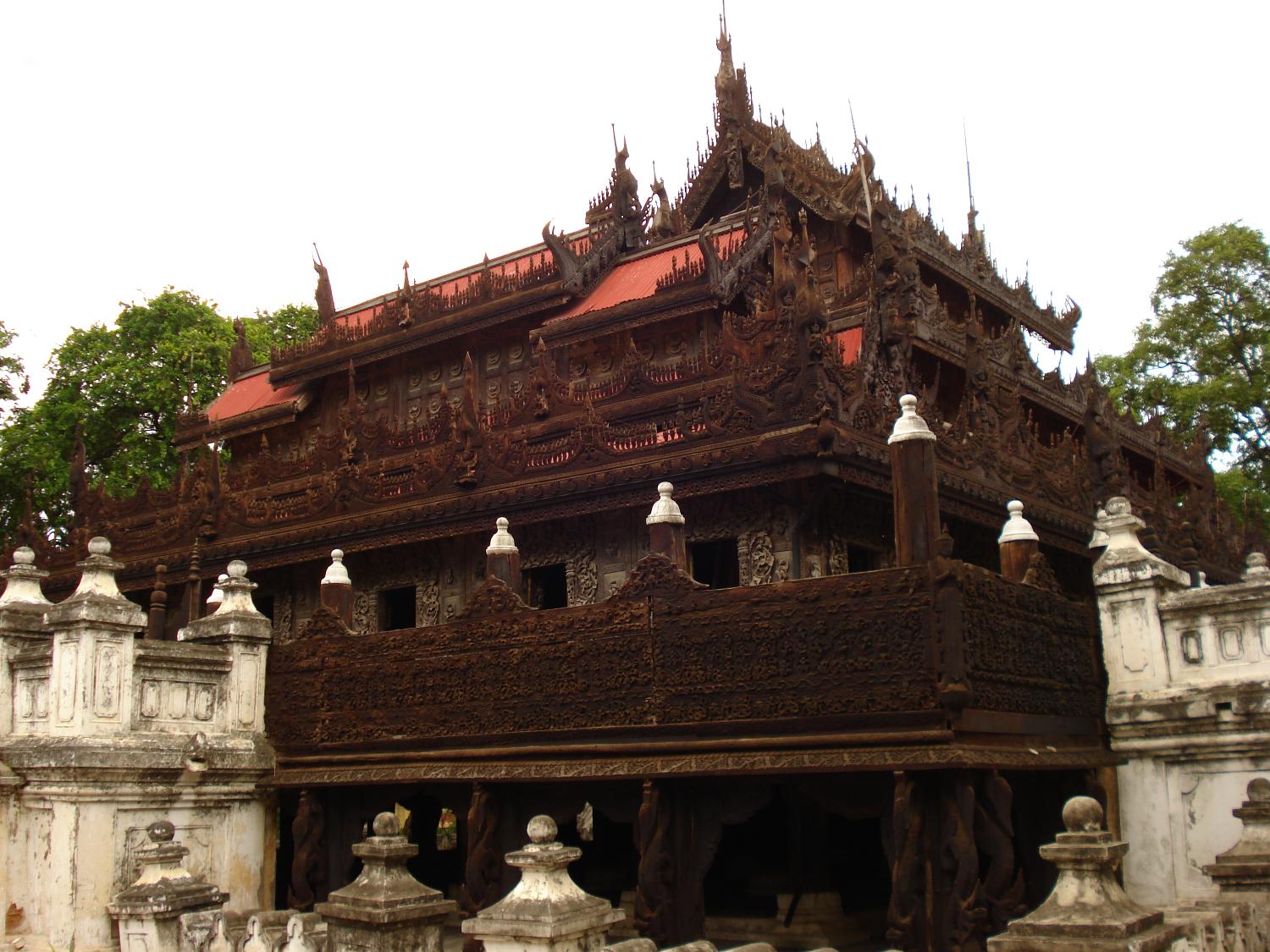 The Shwenandaw Kyaung Temple was originally part of the royal palace in Amarapura but was moved to nearby Mandalay where is remains today.  King Mindo died in the building in 1878 and it was later converted into a monastery dedicated to his memory. The building is made of teak and has intricate wood carvings located throughout the structure.