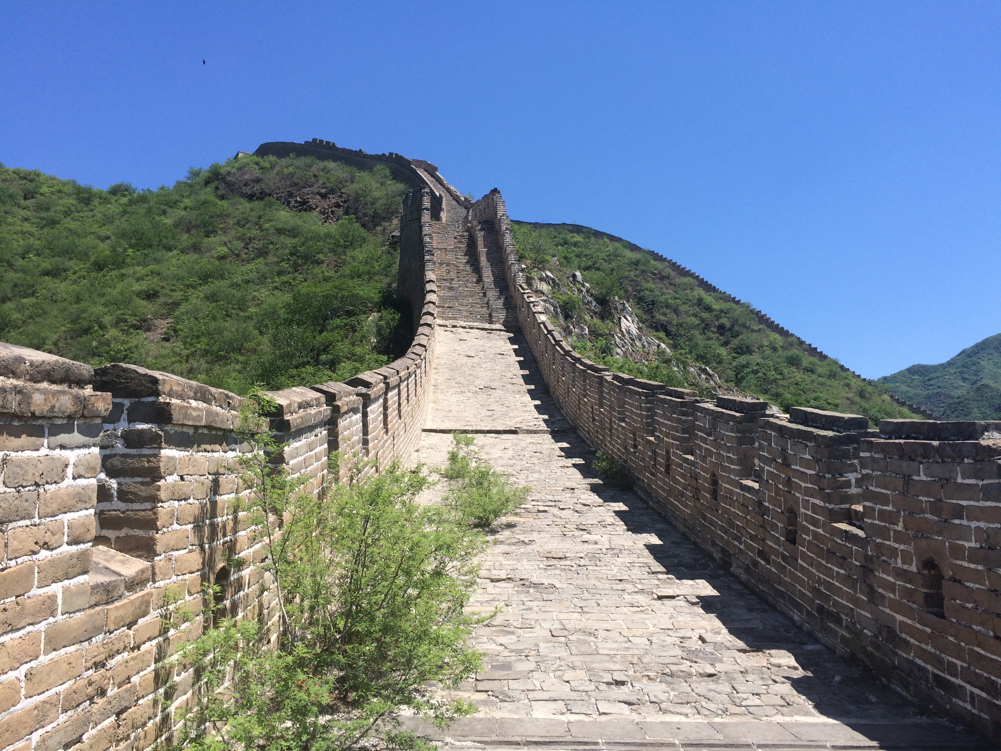 The Huanghuacheng (Lakeside) section of the Great Wall derives its name from the nearby man-made reservoir lakes. Unlike the main tourist sections of the Great Wall at Mutianyu and Badaling, the Lakeside Great Wall draws a far smaller number of tourists. The section features appealing sights including submerged parts of the Great Wall under the lake water and a sweeping view after a steep hike to a high guard tower.