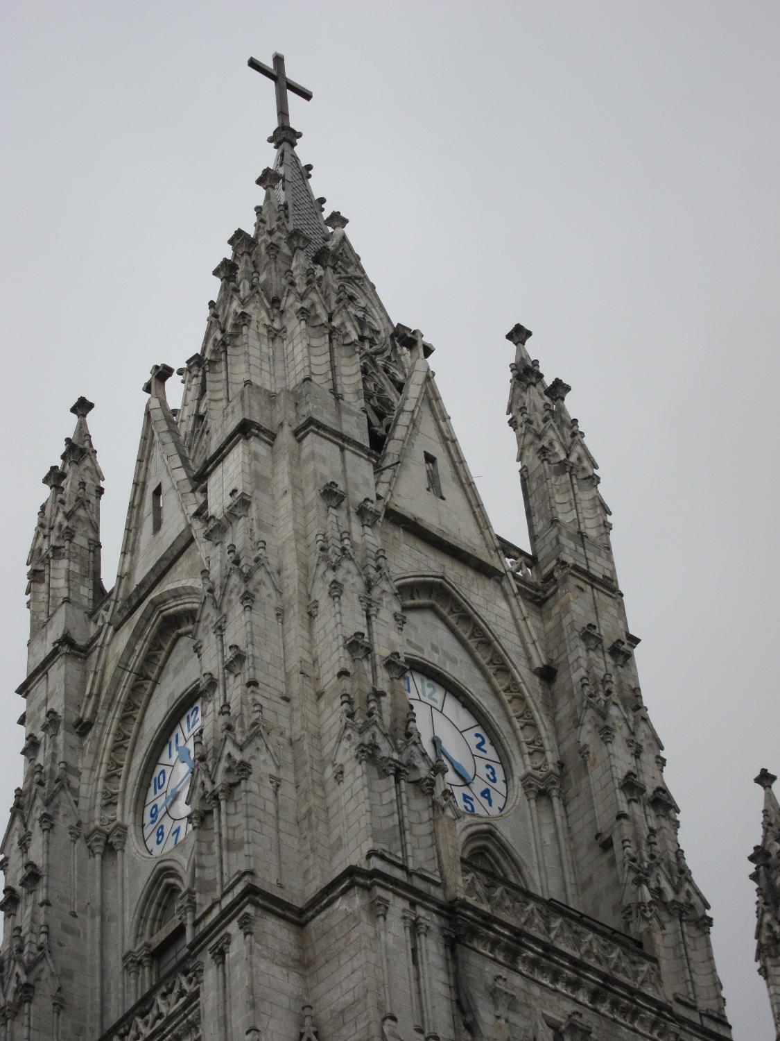 One of the front towers of the Basilica del Voto Nacional (Basilica of the National Vow), a Roman Catholic church in the historic center of Quito. Begun in the late 19th century, it was consecrated in 1988. Technically the basilica remains unfinished, since, according to local legend, its completion would signal the end of the world. 