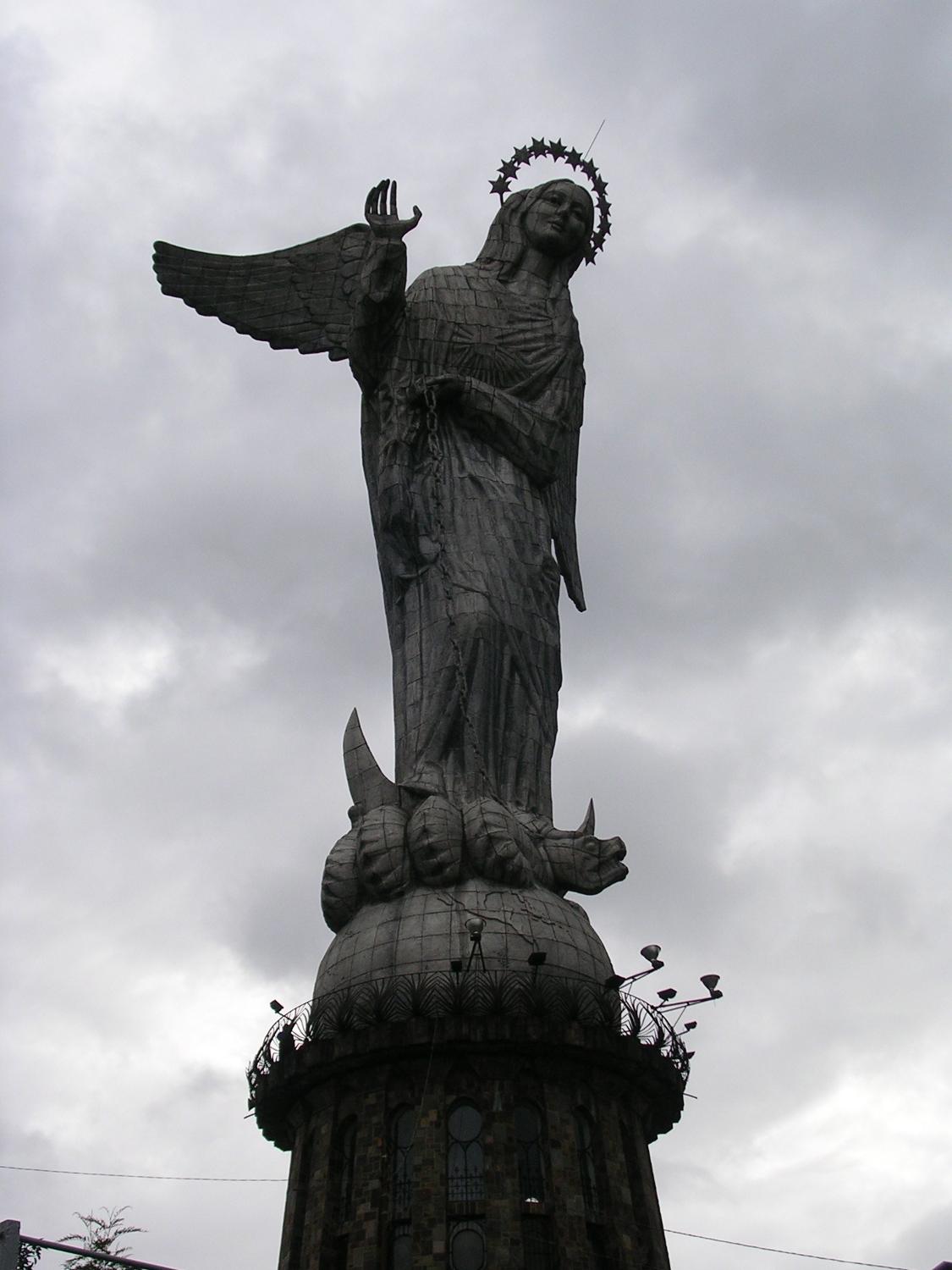 A statue of the "Virgin of the Apocalypse" on El Panecillo (Bread Loaf Hill), overlooking Quito. The 45 m- (148 ft-) tall aluminum statue depicts the Virgin Mary with wings. 