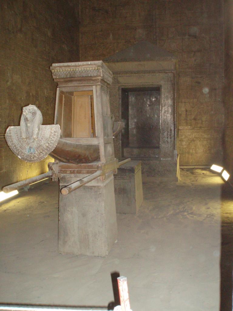 The reproduction of a barque used to transport the god Horus in religious processions around the town of Edfu and on boats north to Dendera to visit the god Hathor. The barque is in the inner sanctuary of the Temple of Horus at Edfu.