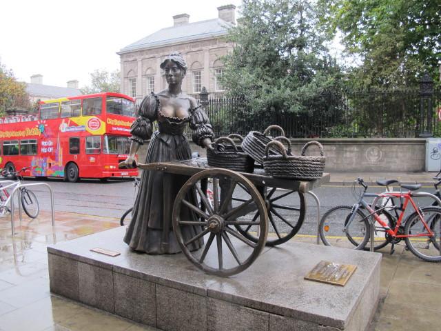 Molly Malone statue on Grafton Street in Dublin. The statue is of a fictional fishmonger in Dublin, who died of a fever. The song, "Molly Malone," is the unofficial anthem of Dublin. The statue was unveiled by the Lord Mayor of Dublin in December 1988 as part of the city's millennium celebration.