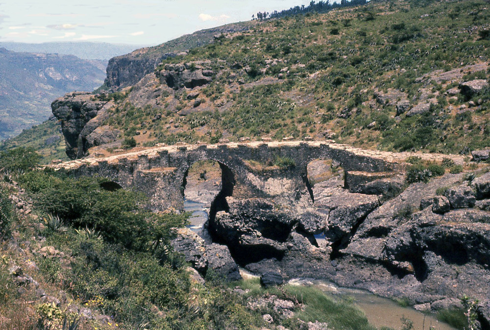 The "Portuguese Bridge" near Debre Libanos in the Oromia Region is a three-arched footbridge that locals claim dates to the 17th, or even the 16th, century (a period when Portugal assisted the Ethiopian monarchy).  In fact, it was built in the early 19th century by Ethiopians, although in the old Portuguese style. This is an upstream view. 