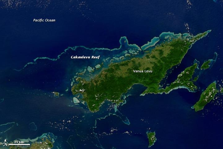 This satellite image shows Fiji's second-largest island, Vanua Levu, and the Cakaulevu Reef that shelters the island's northern shore. Also called the Great Sea Reef, Cakaulevu shines turquoise through clear, shallow waters. It is the third longest continuous barrier reef in the world, behind the Great Barrier Reef in Australia and the Mesoamerica Reef off Central America. When combined with the nearby Pascoe Reef, Cakaulevu Reef is about 200 km (120 mi) long. On its own, the Cakaulevu Reef covers 202,700 sq km (77,200 sq mi).

The first systematic survey of the reef (in 2004) revealed a diverse marine population, including unique mangrove ecosystems and endemic fish. Twelve threatened species live within the reef: 10 fish species, the green turtle, and the spinner dolphin. All of this marine life has traditionally supported the native population, and currently some 70,000 people depend on the reef. After seeing fish populations decline in recent decades, local leaders created a series of marine protected areas in 2005 where fishing is prohibited. Where the ban has been enforced, fish populations have rebounded and spilled over into areas where fishing is permitted. Photo courtesy of NASA.