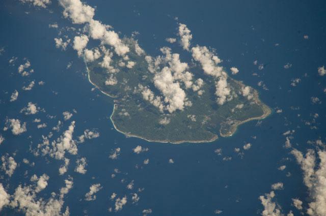 The State of Kosrae is the easternmost of the four states that make up the Federated States of Micronesia; it includes the main island of Kosrae and about a dozen nearby islands and islets. The island is located approximately 600 Km (370 mi) north of the equator, between Guam and the Hawaiian Islands. Its land area is approximately 110 sq km (42 sq mi). Image courtesy of NASA.  