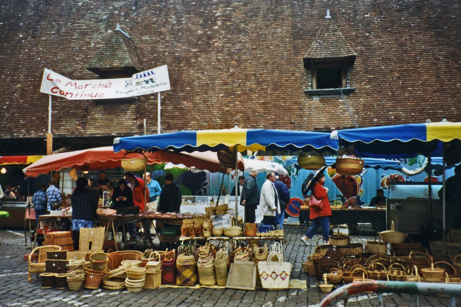 A street market in Beaune, a town located in the heart of the Burgundy wine region. 