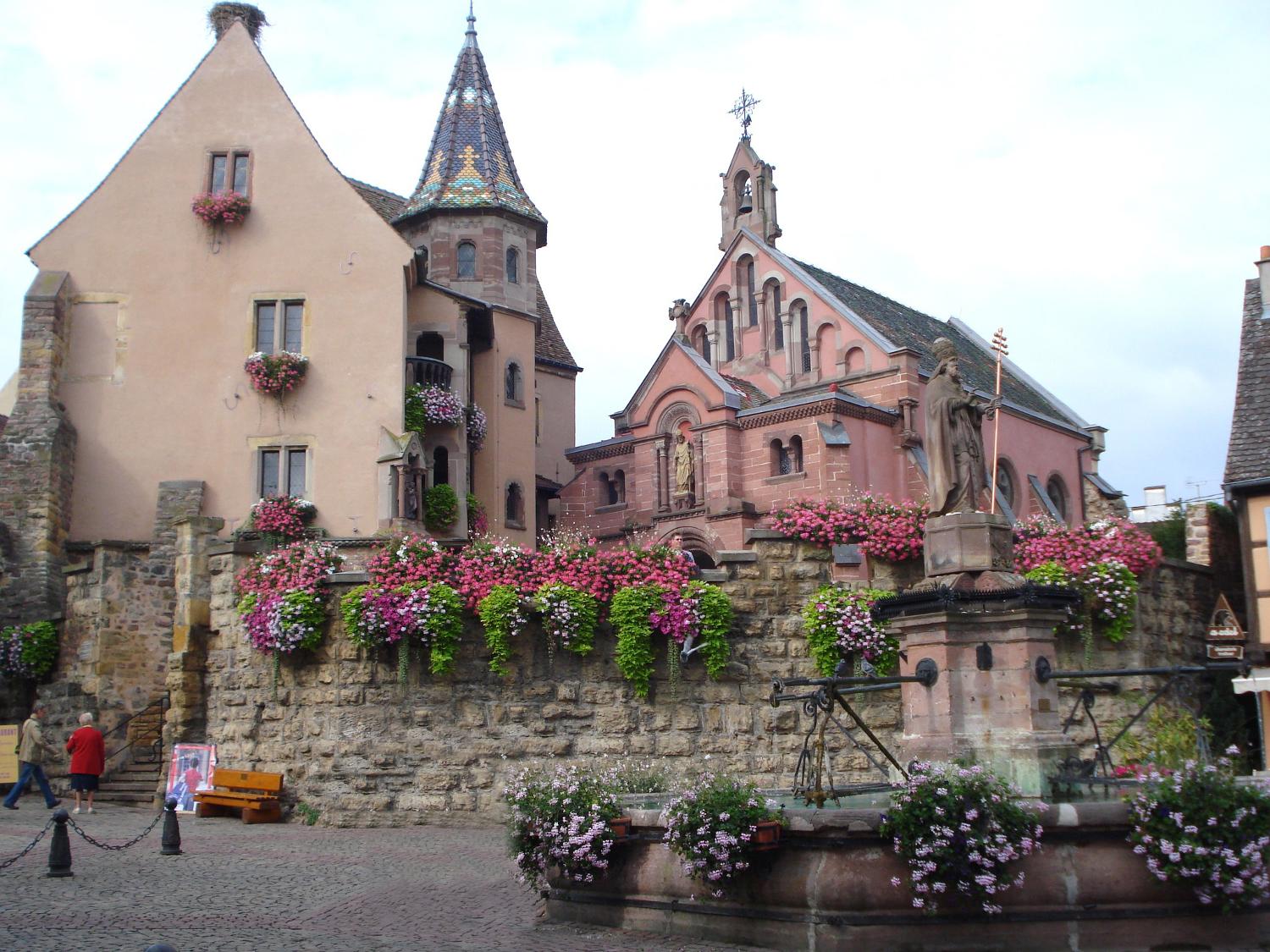 The main square in Equisheim with the Church of Saint Peter and Saint Paul. This church, built in 1808, replaced one dating to medieval times. 