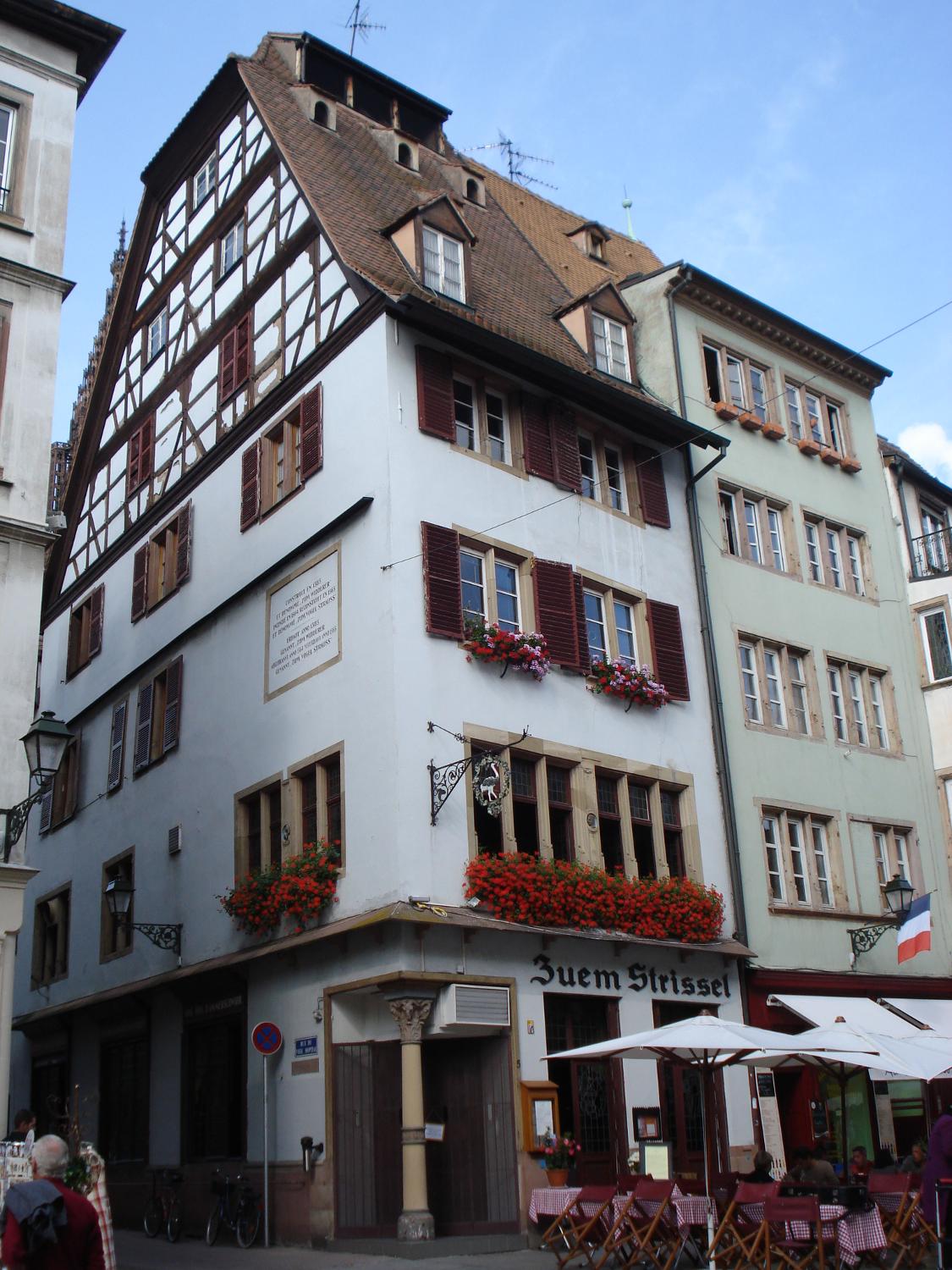 A half timbered house on Grande Ile (Big Island) in Strasbourg. Grande Ile is in the Ill River, which runs through Strasbourg. The entire island has been named a UNESCO World Heritage Site because of its buildings showing developing stages of architecture - beginning in the medieval period and working up to the classical period. Besides Strasbourg Cathedral there are four other venerable churches, as well as the Palais Rohan,  a former residence of the prince-bishops of the area.