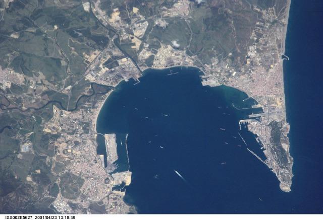 Algeciras, Spain (left), the Bay of Gibraltar (Bahia de Algecira), and Gibraltar itself (right) are featured in this detailed vertical view over the European side of the Strait of Gibraltar. Ship traffic in the bay can easily be seen. Image courtesy of NASA. 