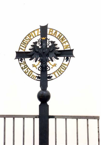 The black and gold cross that marks Germany's highest point on its tallest mountain, Zugspitze.