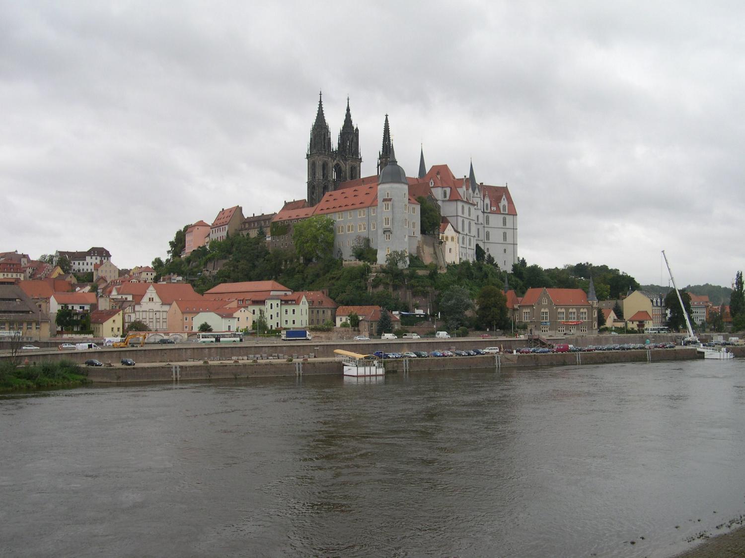 Albrechtsburg Castle and the Meissen Cathedral overlooking the city of Meissen, the "cradle of Saxony" and the capital of the Margraves of Meissen. The castle, designed in late Gothic style, was constructed in the 15th century as a residence. It is now a museum with murals illustrating the history of Saxony Meissen. The Gothic Meissen Cathedral, begun in 1260 on the same hill as the castle, is one of the smallest cathedrals in Europe. 