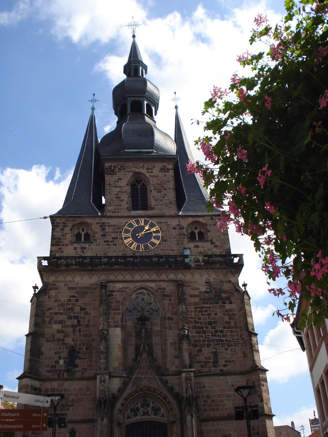 The basilica of Sankt Wendel (St. Wendel) in the eponymous town near Trier. The site was originally named Basonevillare (Baso's farm) after the feudal lord who owned it. The Bishop of Verdun bought the town in the mid-7th century, and erected a church over the grave of a very popular hermit Wendelin who died near Basonevillare. The church became such a popular pilgrimage destination that eventually a new church had to be built and Wendelin's remains were transfered there. The area around the new church became a marketplace and a town called Sankt Wendel.