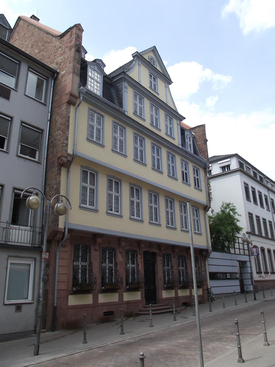 The Goethe House at 23 Grosser Hirschgraben in the old town of Frankfurt was the residence of the Goethe family until 1795. The family's most notable personality, Johann Wolfgang von Goethe, was born there in 1749, lived there till the age of 16, and returned sporadically throughout his life. The house stands next to the Goethe Museum (on the right).