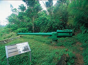 The Piti Guns unit of the War in the Pacific National Historical Park is the site of three Vickers type Model 3 140mm coastal defense guns. During the Japanese occupation of Guam from 1941-1944, the Chamorro population was forced to work in building up these defenses. Photo courtesy of the US National Park Service. 