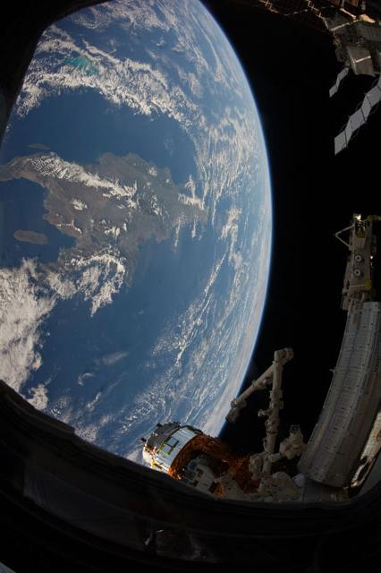 The Caribbean island of Hispaniola, jointly occupied by Haiti and the Dominican Republic, dominates this space station view of the earth. Haiti, with its northern and southern pincer-like peninsulas, takes up the western third of the island, while the Dominican Republic occupies the triangular eastern two-thirds. Haiti's capital of Port-au-Prince lies at the eastern end of the notch-like bay named Canal de Saint-Marc. Photo courtesy of NASA.