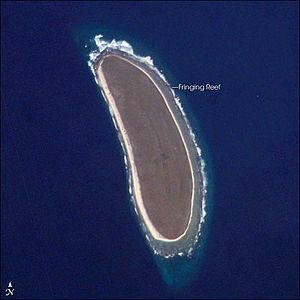 Howland Island is a US possession located in the north Pacific between Australia and the Hawaiian Islands. Prior to 1890, organic nitrate (guano) was mined from the island by both the US and the British. This tiny island (2.6 sq km) is currently part of the US National Wildlife Refuge system, and provides nesting areas and forage for a variety of birds and marine wildlife.
