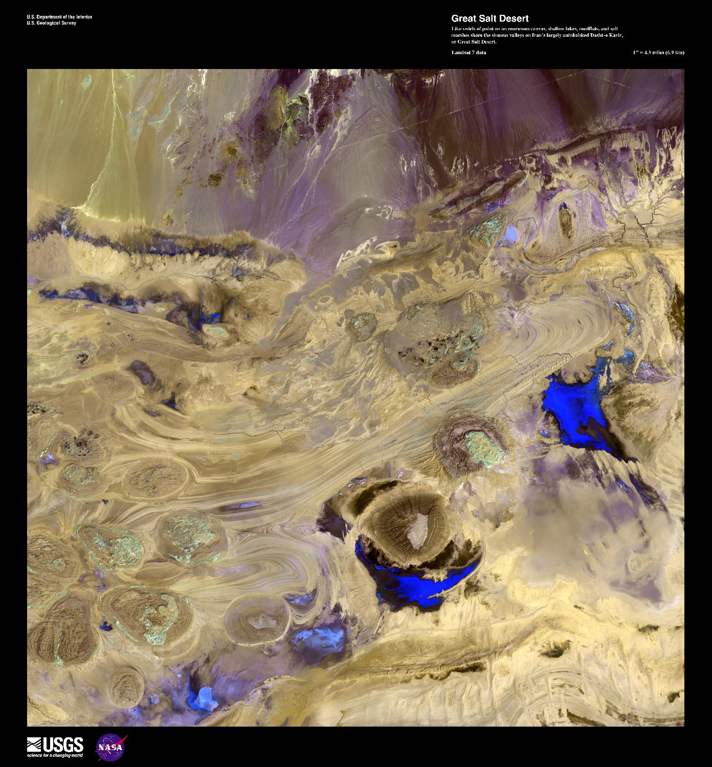 In this enhanced false-color satellite photo, shallow lakes, mudflats, and salt marshes share the sinuous valleys on Iran's largely uninhabited Dasht-e Kavir, or Great Salt Desert. Due to the high heat and arid climate, marshes, lakes, and wadis experience an extreme rate of groundwater evaporation leaving large crusts of salt. Image courtesy of USGS.