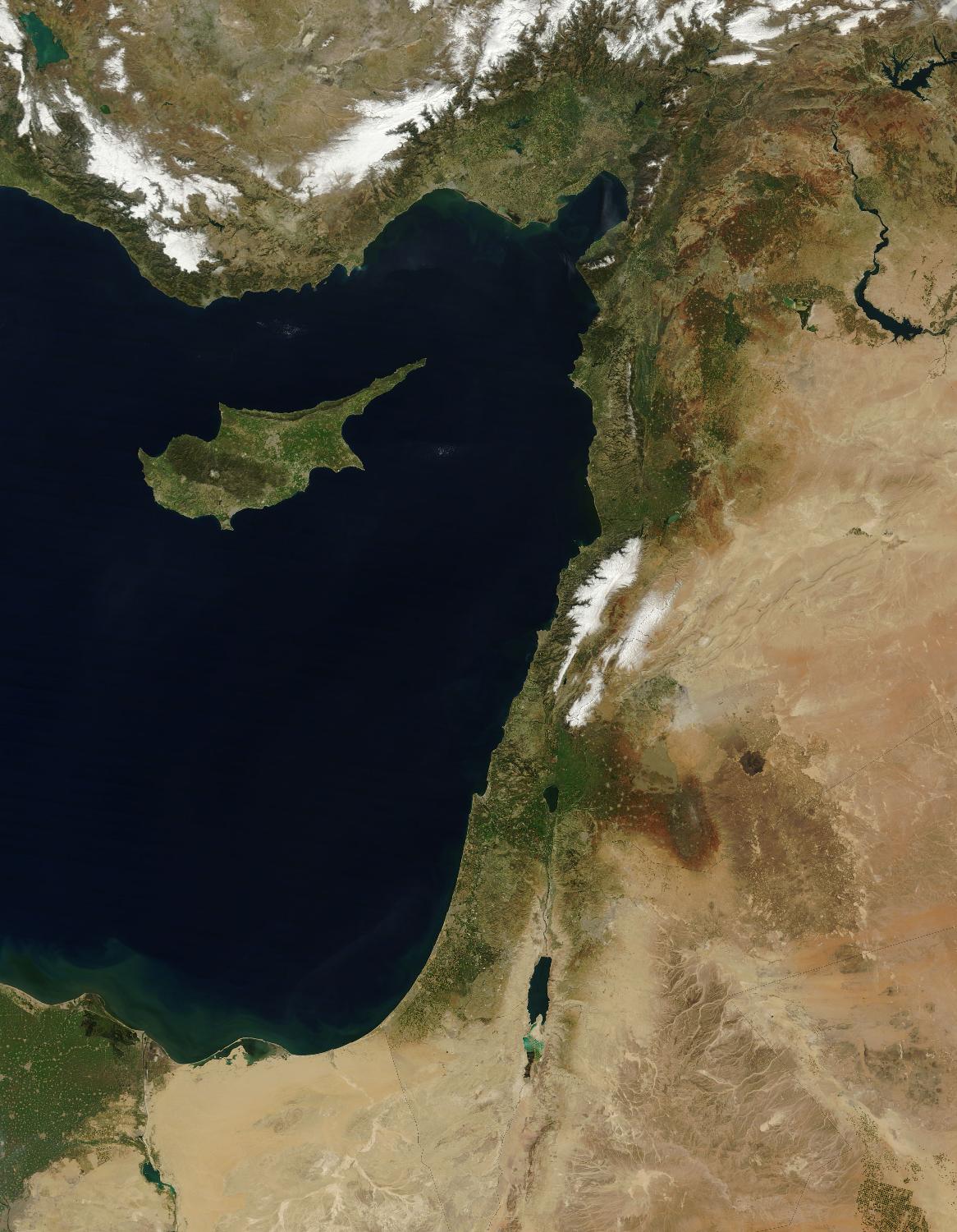 The Levant, the eastern coast of the Mediterranean Sea, is vividly displayed on this satellite image. Cyprus' distinctive shape points to the Gulf of Iskenderun in southern Turkey. Other Levant countries in a clockwise direction are Syria, Lebanon, Israel, and Egypt. Snow appears clearly in the mountains of Turkey (top) and Lebanon (center) and in thin strips in between in the highlands of Syria. The contrast between the well-watered northern half of Israel and the desert south is starkly evident. Photo courtesy of NASA.