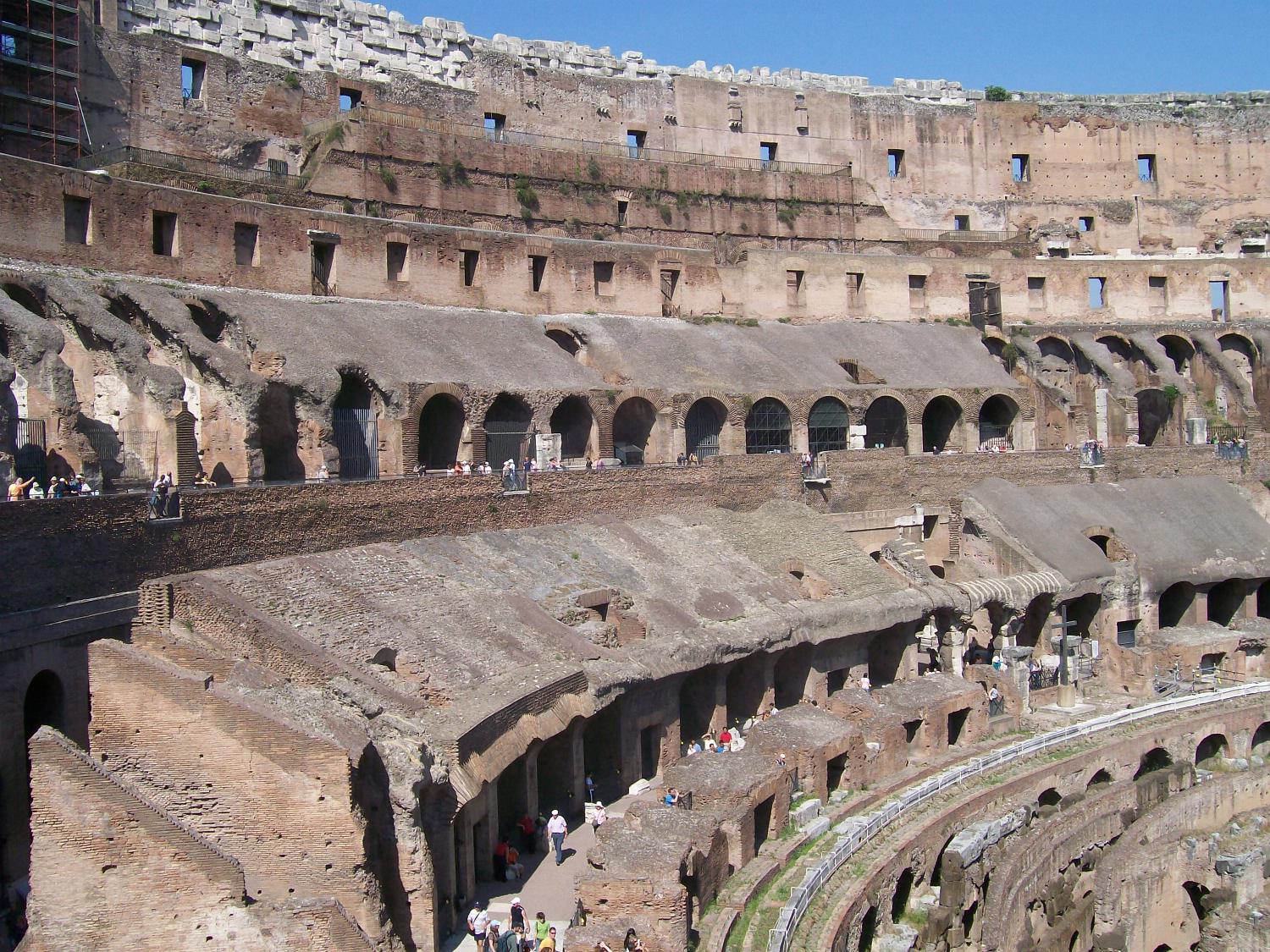 The Colosseum in Rome, the largest ever built in the Roman Empire, could seat 50,000 (some estimates go as high as 80,000). Begun in A.D. 72 and completed in A.D. 80, it accommodated gladiatorial contests, games, and spectacles. This is a view of its ruins from the inside. 