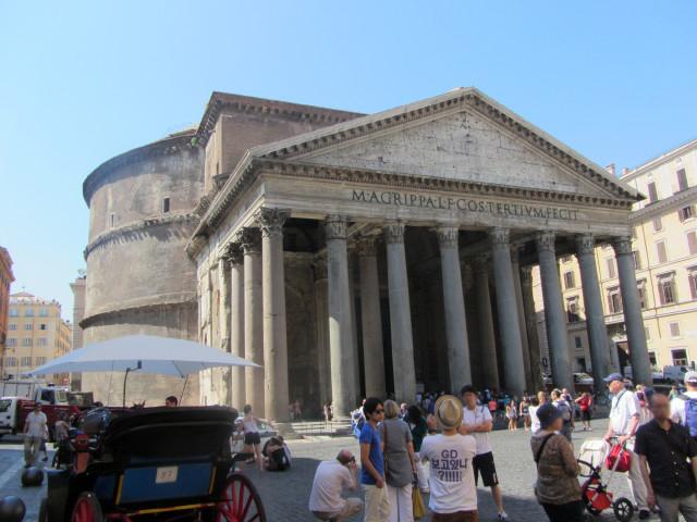 The Pantheon in the Plaza della Rotonda in Rome. Its current form dates from about A.D. 126 when the Emperor Hadrian rebuilt it over Marcus Agrippa's original temple dating from 27 B.C. The temple was dedicated to the classical gods. The name comes from the Greek words pan (all) and theos (god). The Pantheon has been a Christian church since about 608.