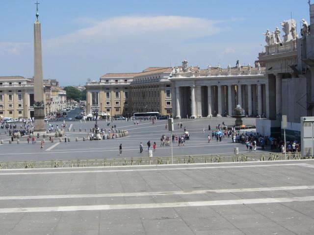 View of Saint Peter's Square in Rome showing an Egyptian obelisk, the Via della Conciliazione, and colonnades with statues on the sides of the square. The square, designed by Gian Lorenzo Bernini, was constructed between 1658 and 1667.