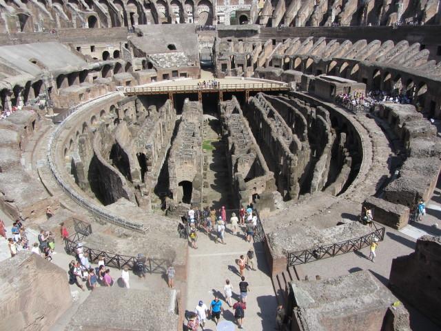 The Colosseum in Rome showing the interior with a partial reconstruction of the wooden arena floor. The rooms and passageways under the floor were used for performers, sets, and animals. The arena could be flooded to recreate sea battles.