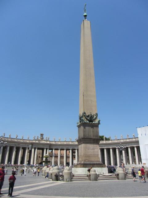 An Egyptian obelisk in Saint Peter's Square in Rome. Composed of red granite, the obelisk is 25.5 m tall (41 m to top of cross).  It was transferred to Rome by the Emperor Caligula in A.D. 37, and moved to its current location at the direction of Pope Sixtus V in 1586. It is the only Egyptian obelisk in Rome never to have fallen.