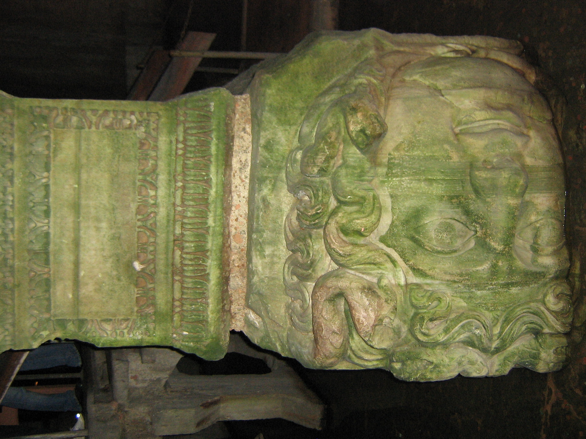 One of two Medusa head pillars in the Basilica Cistern beneath Istanbul. The Medusa heads heads were removed from a building of the late Roman period and brought to the cistern to be reused as pillar bases.