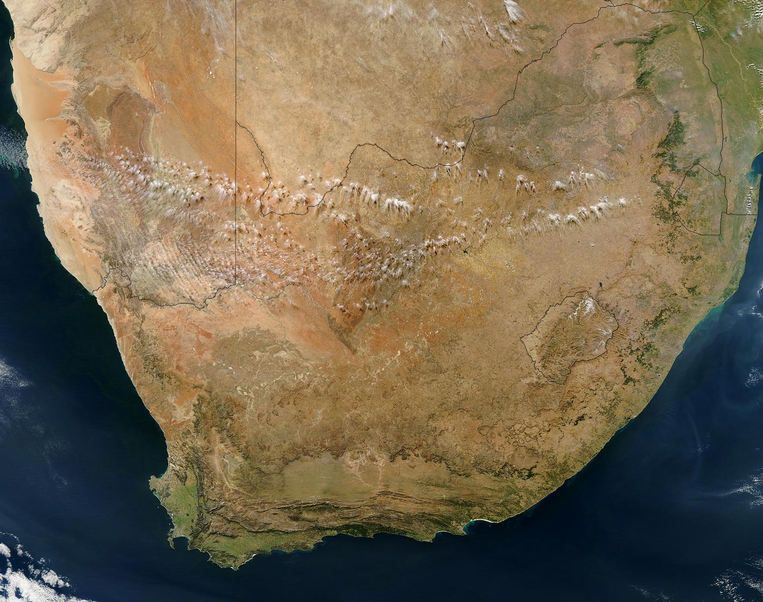 Satellite view of southern Africa. The bulk of image is taken up by the Republic of South Africa. Within South Africa is the roughly circular enclave of Lesotho. Northeast of Lesotho is the smaller country of Swaziland. Photo courtesy of NASA. 