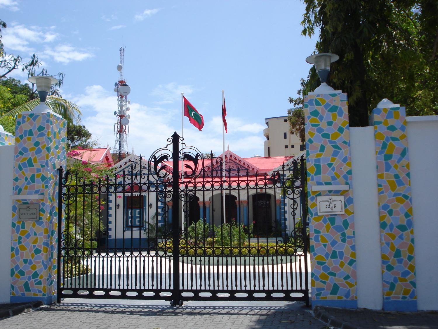 Mulee-Aage Palace in Male was built in 1906 by Sultan Shamsuddeen III as a home for his son. In 1936, the sultan was banished and the building became the new government's property. In 1986, the building was named the president's official residence. Today there is a new official residence and Mulee-Aage serves as the president's office. It is noted for its exquisite white carvings.