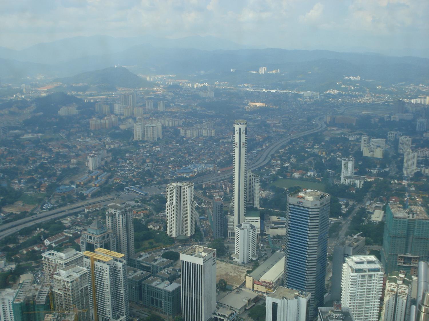 Kuala Lumpur (Muddy Confluence) as seen from the Petronas Twin Towers. As the largest city and capital of Malaysia, Kuala Lumpur serves as the seat of parliament and the official residence of the king.  