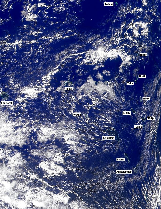 Satellite photo showing most of the Marshall Islands archipelago. Majuro and Arno Atolls in the next image  lie to the lower right of this photo. Image courtesy of NASA.