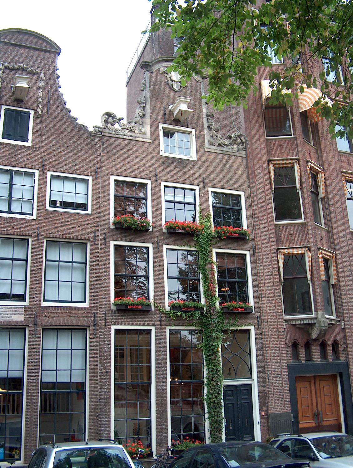 Modernized facades on older buildings in Amsterdam.