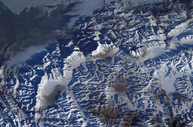 This view shows K-2 Mountain (upper center) in Pakistan, the world's second highest peak, as seen from the International Space Station. The mountain (8,611 m; 28,251 ft high) is sometimes referred to as Savage Mountain, because of the difficulty of its ascent and the many lives lost in attempting its climb. Image courtesy of NASA.