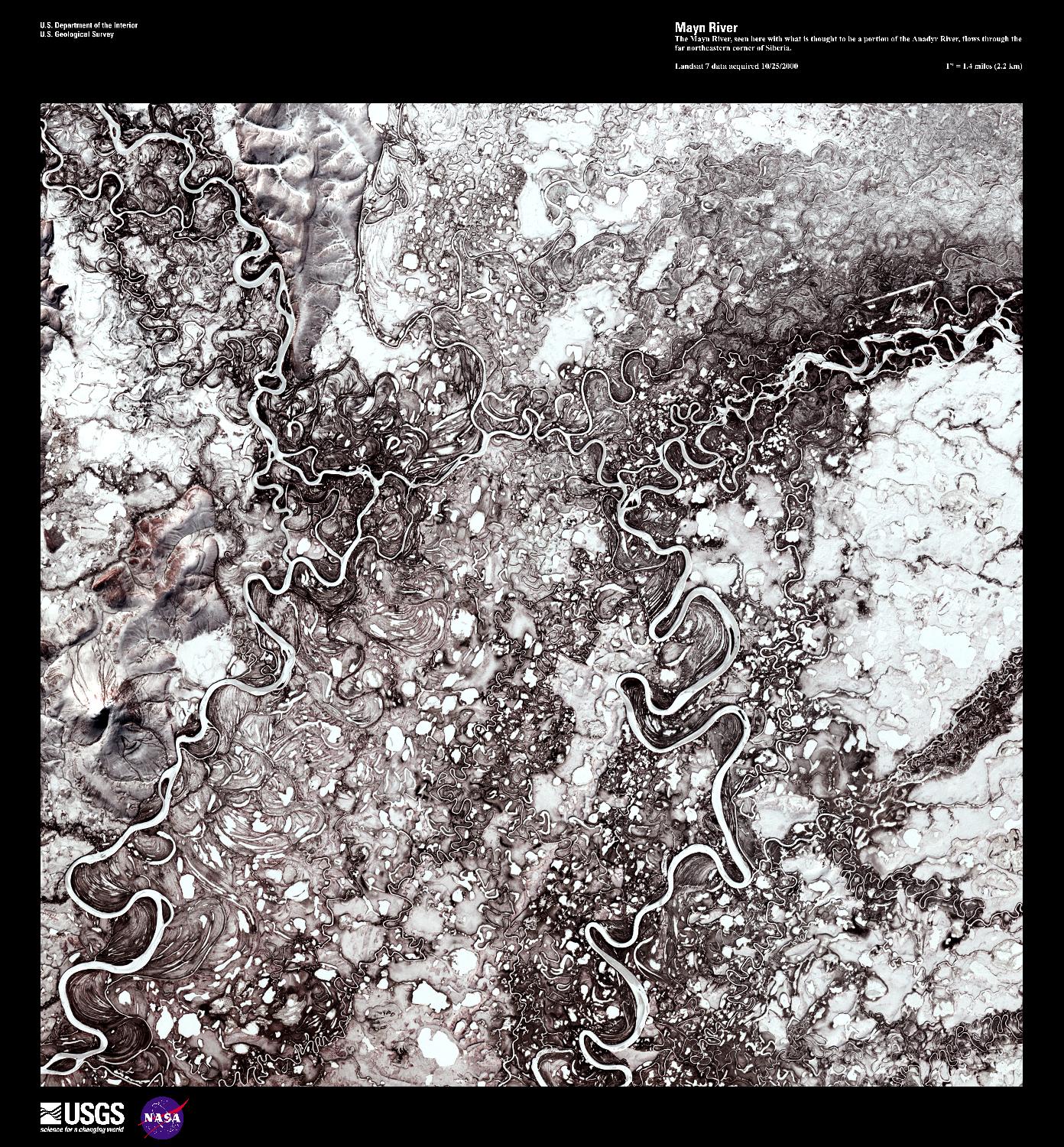 The Mayn River (on the left), seen here in a false color satellite image with a portion of the Anadyr River (on the right), flows through the far northeastern corner of Siberia. Both rivers carry a great deal of sediment and over time have created an amazing number of oxbow lakes. In this forest-tundra zone, both rivers remain frozen for 8 to 9 months out of the year. Image courtesy of USGS.