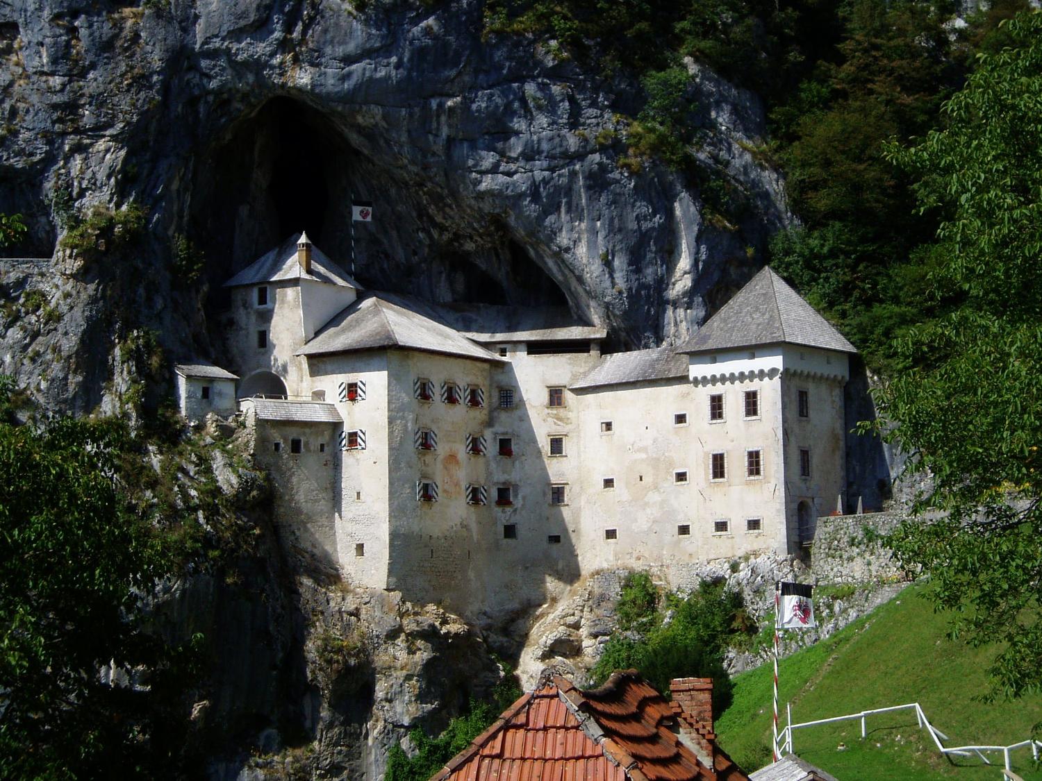 Predjama Castle in Slovenia, a large fortress built into a huge hillside cave.

