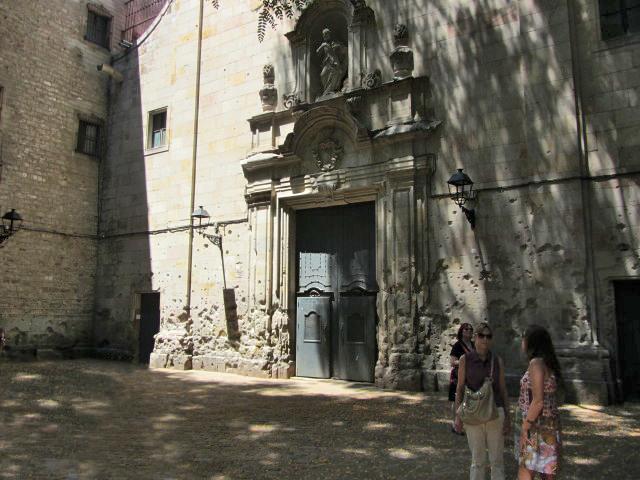 Evidence of damage dating back to the Spanish Civil War (1936-1939) may be seen on this church wall in the Old City in Barcelona.
