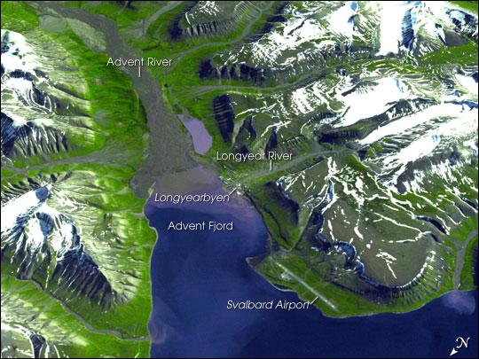 Spitsbergen, the largest of the islands in the Svalbard Archipelago, sits well inside the Arctic Circle, just south of 80 degrees north latitude. This image of the island and its topography was captured by NASA's Terra satellite. The rugged mountains are capped with snow and glaciers, with only the river valleys and low elevations supporting vegetation. Braided, shallow rivers filled with glacial sediment occupy the valleys. The vertical scale is exaggerated by a factor of two to emphasize the rugged terrain. The small town of Longyearbyen serves as the capital; its small airport provides the most northerly public airline service on earth. Although coal mining is still an important economic activity on the frigid island, scientists have recently become as interested in what can be tucked away in the frozen mountains of Spitsbergen as what can be extracted from them. In late February 2008, Norway accepted the first deposit for a so-called "Doomsday" agricultural seed vault, drilled deep into the mountains overlooking the Svalbard Airport. Financed by Norway, the Svalbard Global Seed Vault will safeguard seeds of human food crops from all over the world in the event a natural or human-caused catastrophic event would threaten the human food supply. Photo courtesy of NASA.